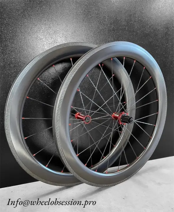 58 mm carbon rim-brake wheelset with red Carbon-Ti hubs